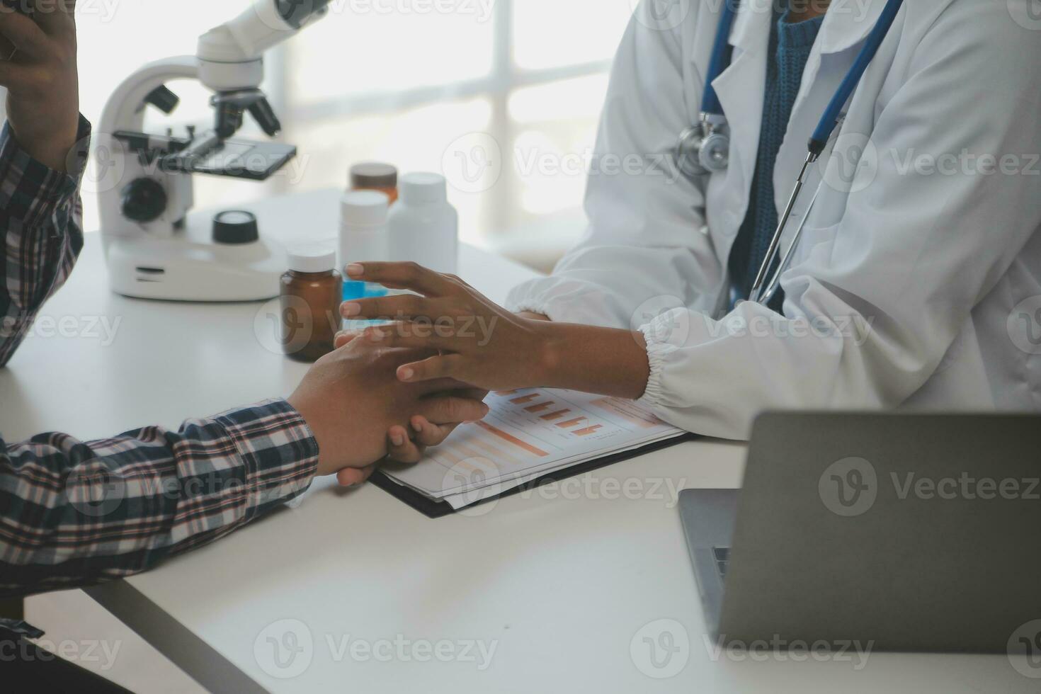 Professional lab. Amazing longhaired medical worker wearing uniform while using microscope during research photo