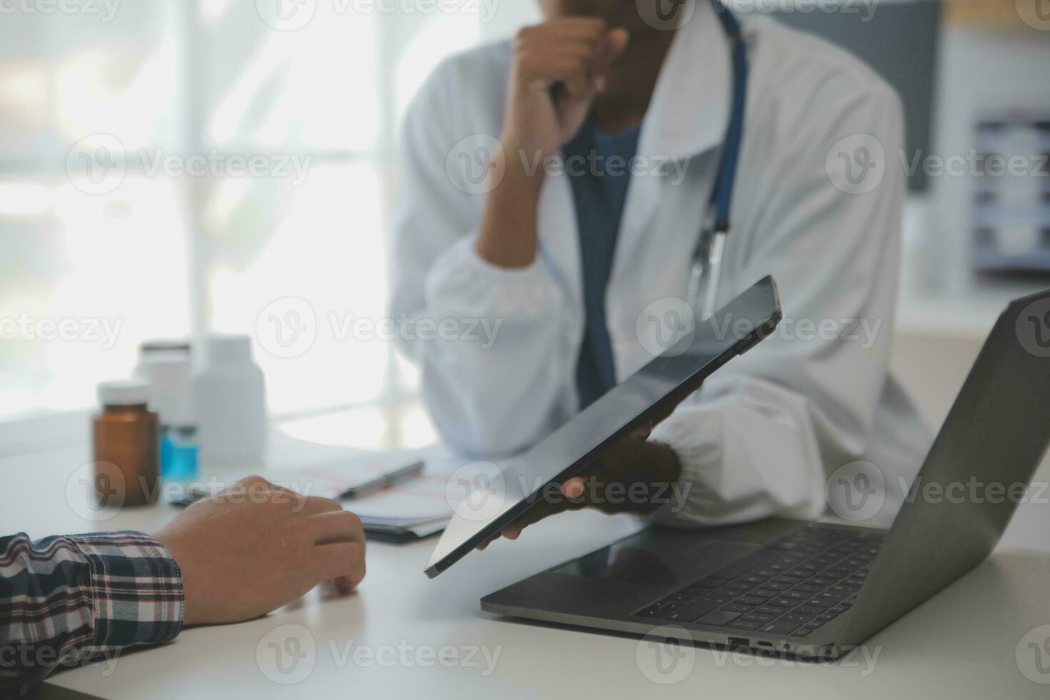 Professional lab. Amazing longhaired medical worker wearing uniform while using microscope during research photo