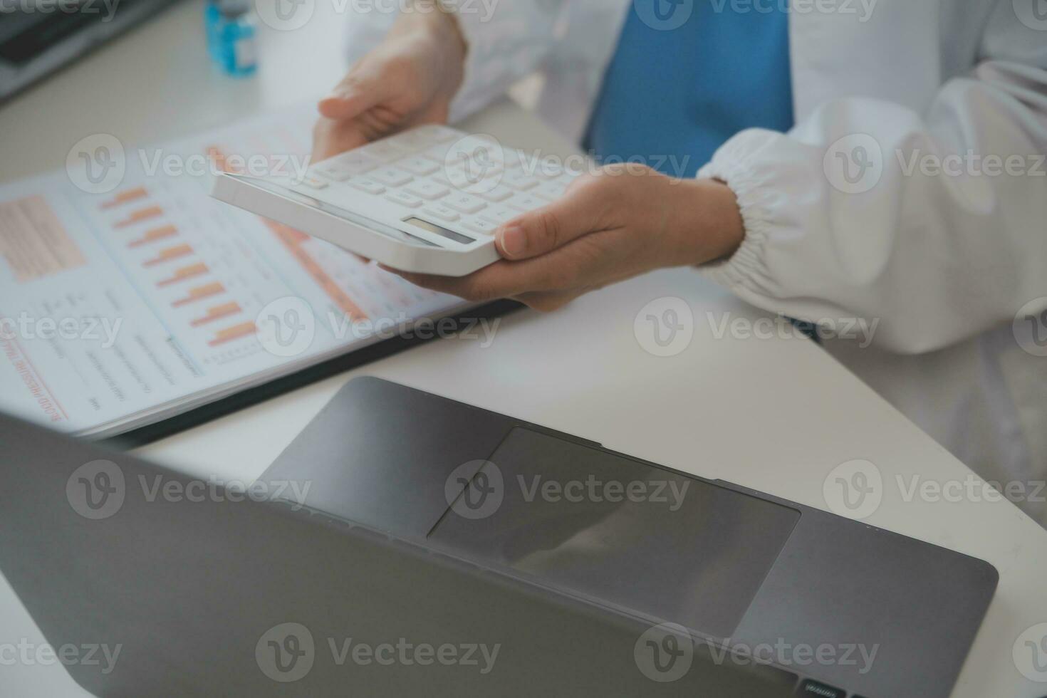 Professional lab. Amazing longhaired medical worker wearing uniform while using microscope during research photo
