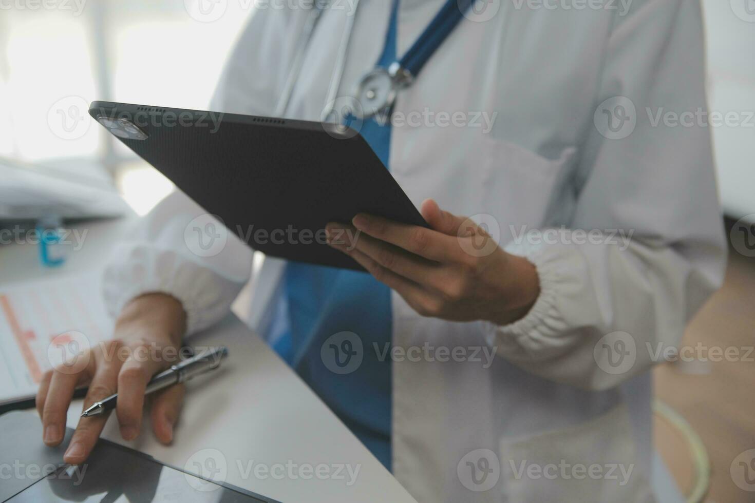 Professional lab. Amazing longhaired medical worker wearing uniform while using microscope during research photo