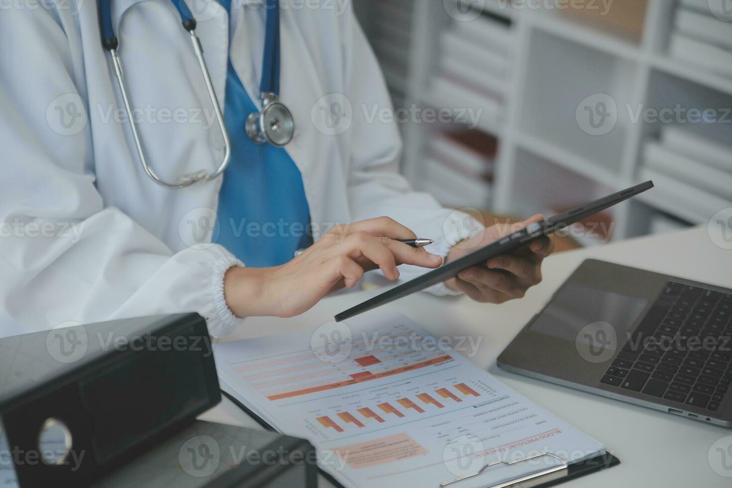 Professional lab. Amazing longhaired medical worker wearing uniform while using microscope during research photo