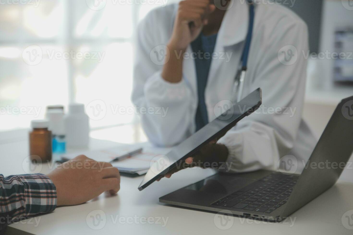 Professional lab. Amazing longhaired medical worker wearing uniform while using microscope during research photo
