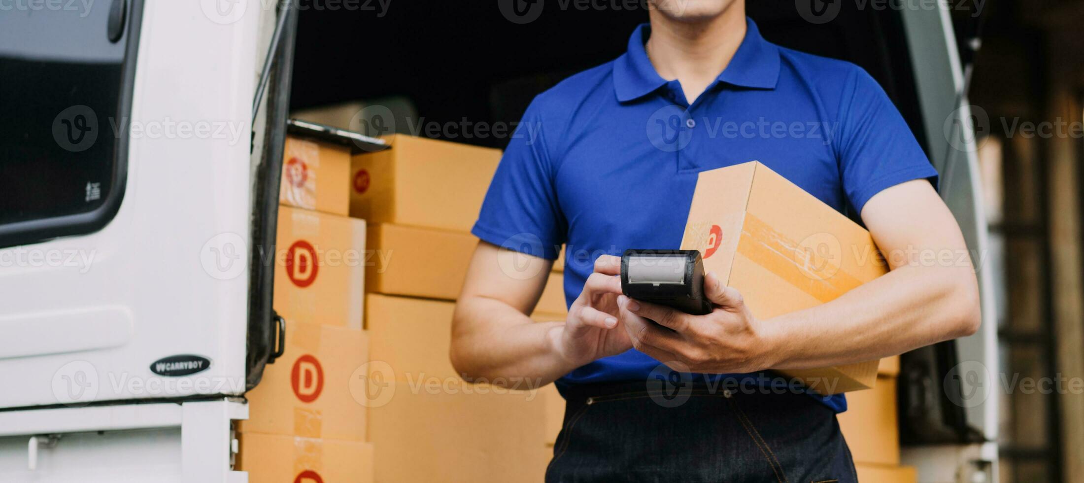 Young woman small business owner online shopping at home. taking note of orders from customers with mobile phones. SME entrepreneur or freelance life style concept. photo