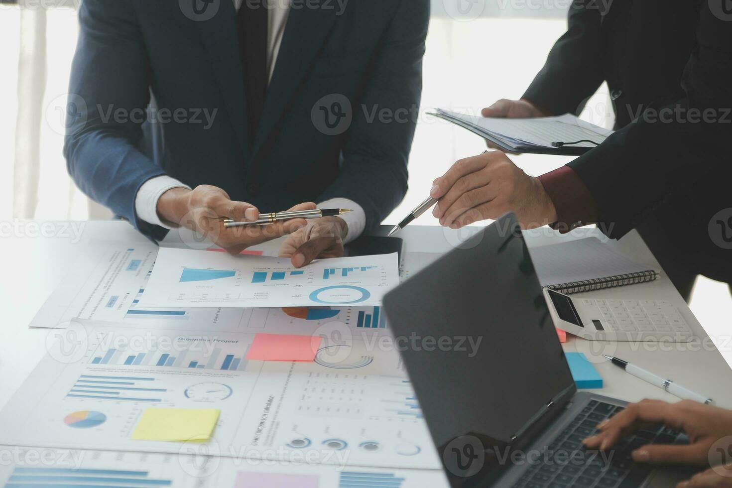 Entrepreneurs and business people conference in modern meeting room, happy multiracial coworkers have fun cooperating working together at office meeting, asian teamwork concept photo