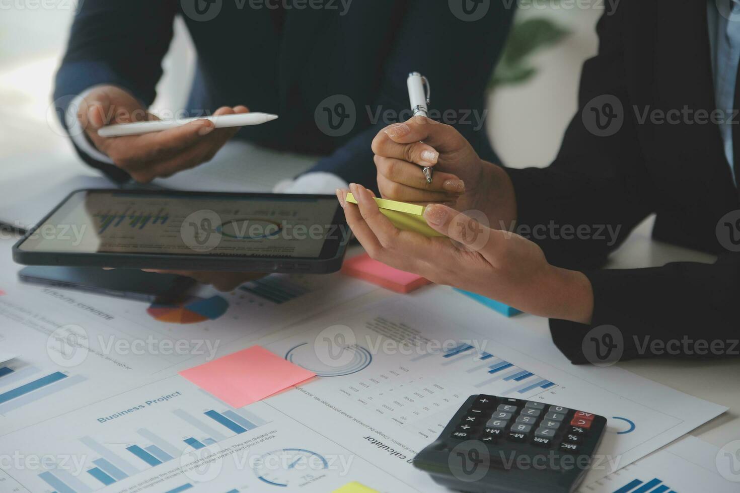 Entrepreneurs and business people conference in modern meeting room, happy multiracial coworkers have fun cooperating working together at office meeting, asian teamwork concept photo