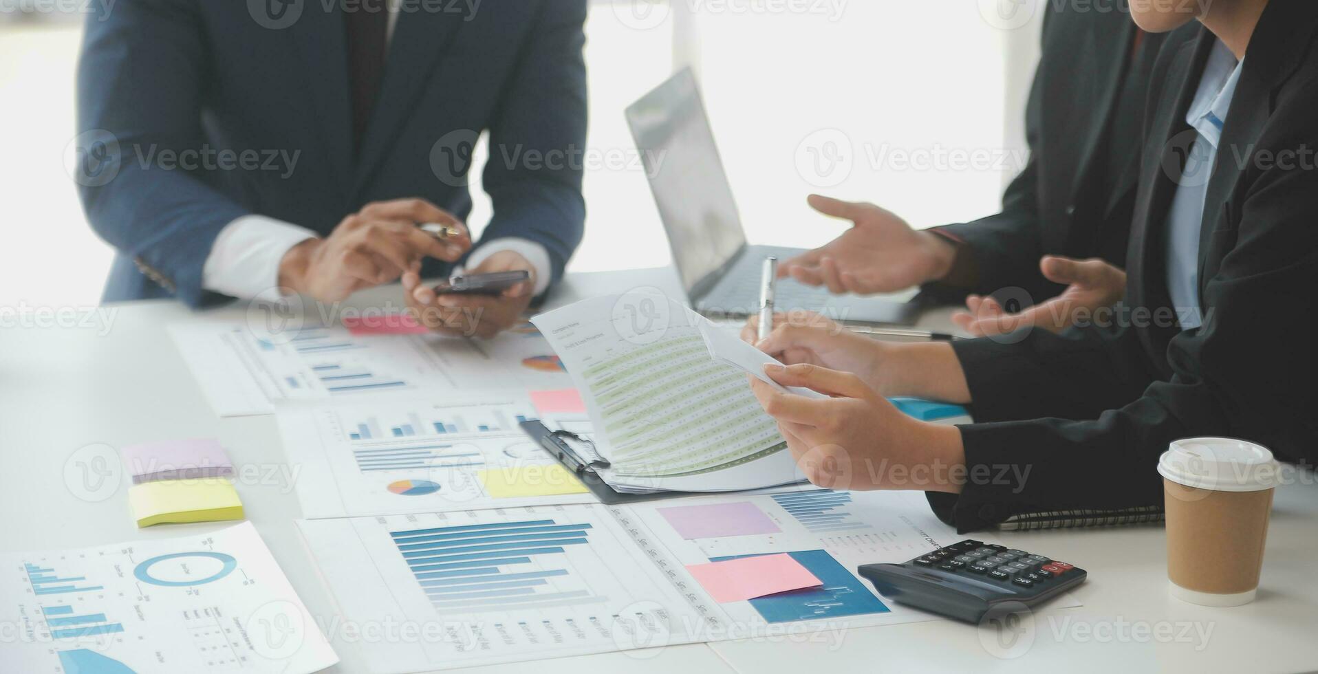Entrepreneurs and business people conference in modern meeting room, happy multiracial coworkers have fun cooperating working together at office meeting, asian teamwork concept photo