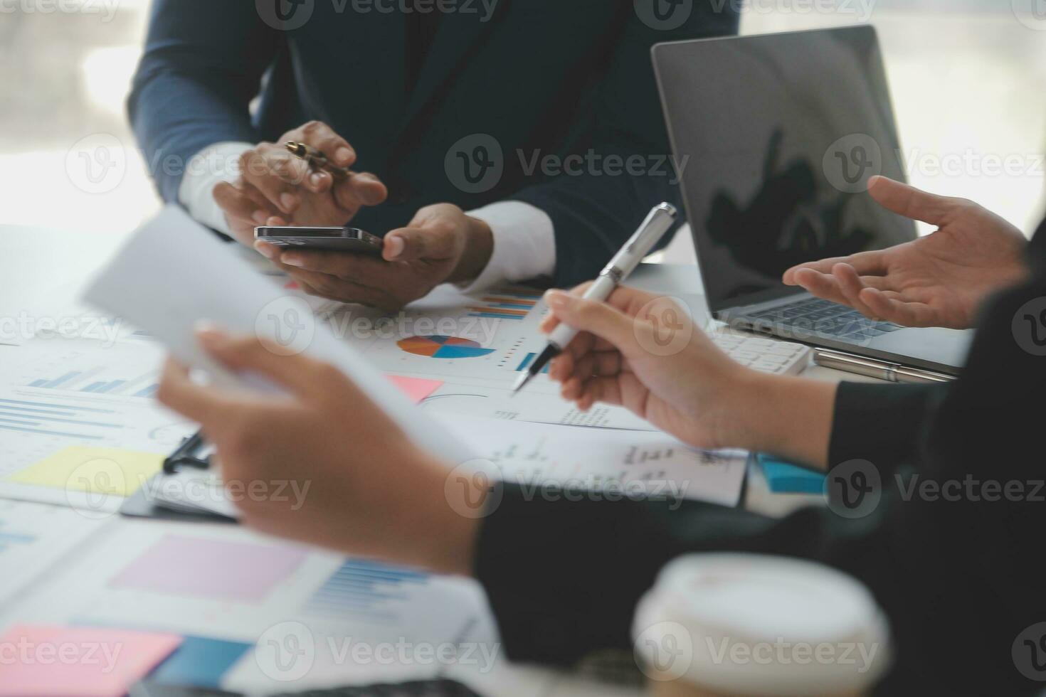 Entrepreneurs and business people conference in modern meeting room, happy multiracial coworkers have fun cooperating working together at office meeting, asian teamwork concept photo