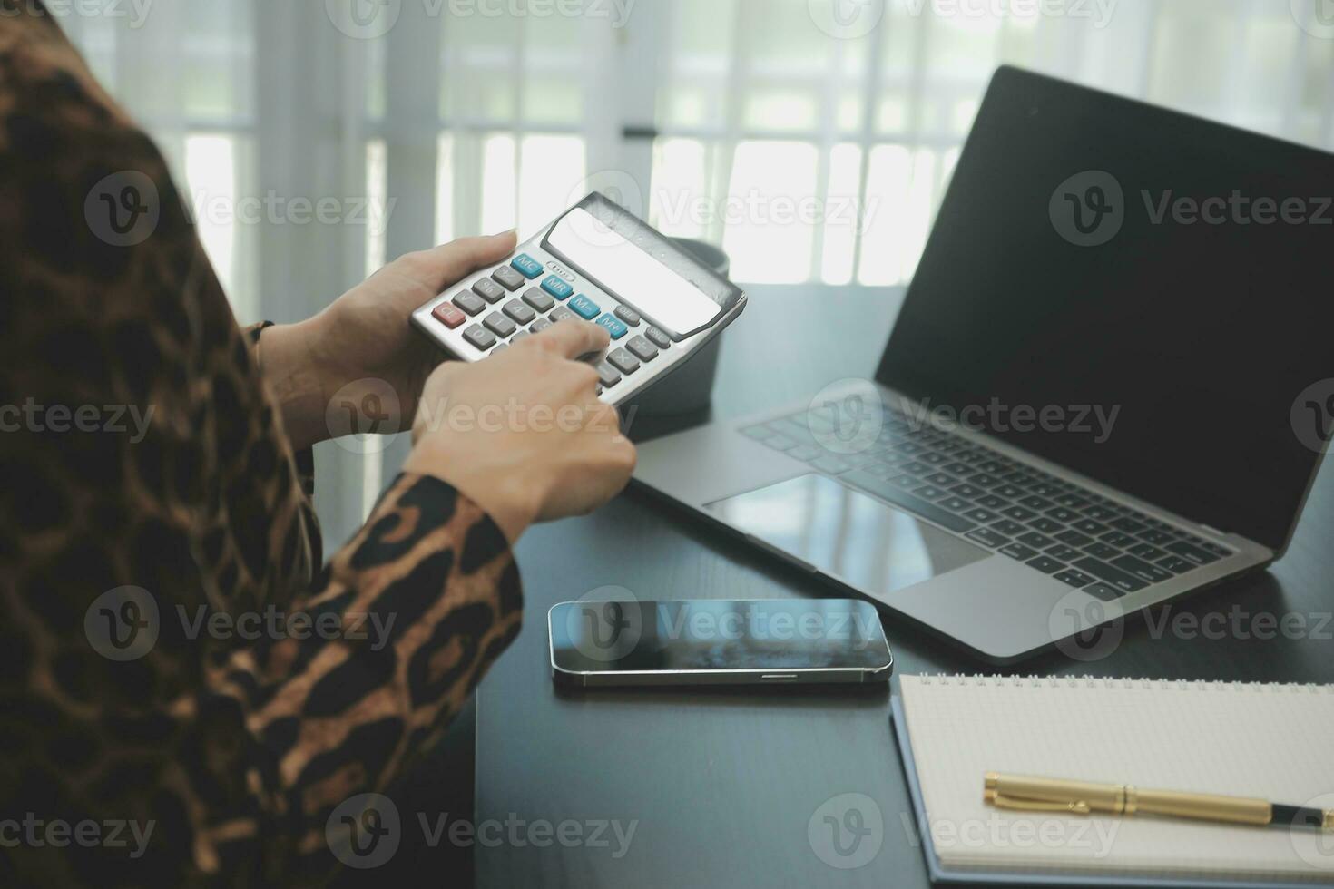 Audit concept,Administrator business man financial inspector and secretary making report calculating balance. Internal Revenue Service checking document. photo
