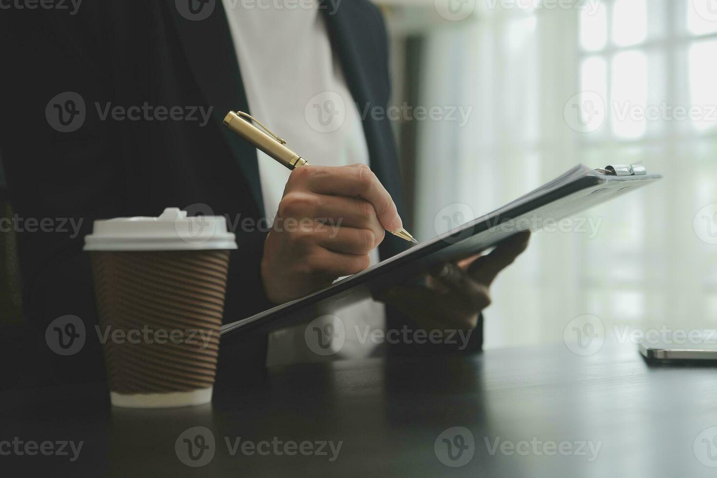Audit concept,Administrator business man financial inspector and secretary making report calculating balance. Internal Revenue Service checking document. photo