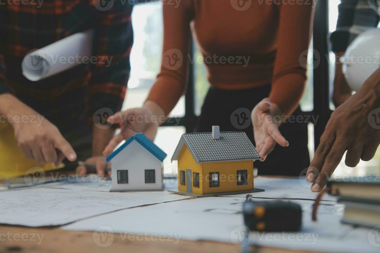 Engineer Teamwork Meeting, Drawing working on blueprint meeting for project working with partner on model building and engineering tools in working site, Construction and structure concept. photo