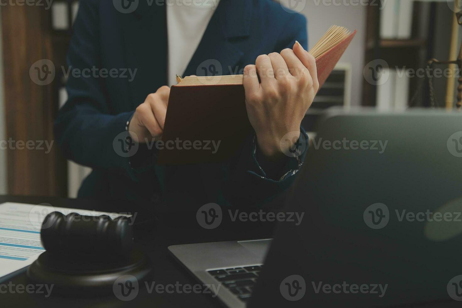 Business and lawyers discussing contract papers with brass scale on desk in office. Law, legal services, advice, justice and law concept picture with film grain effect photo