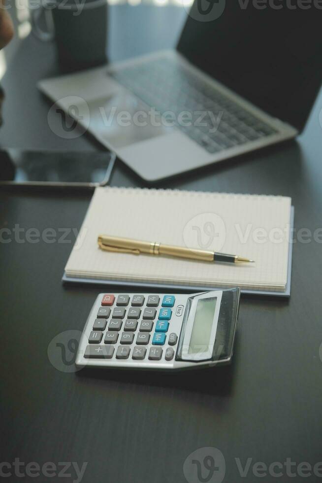 Business advisor, business people talking, planning analyze investment and marketing on tablet in office. photo