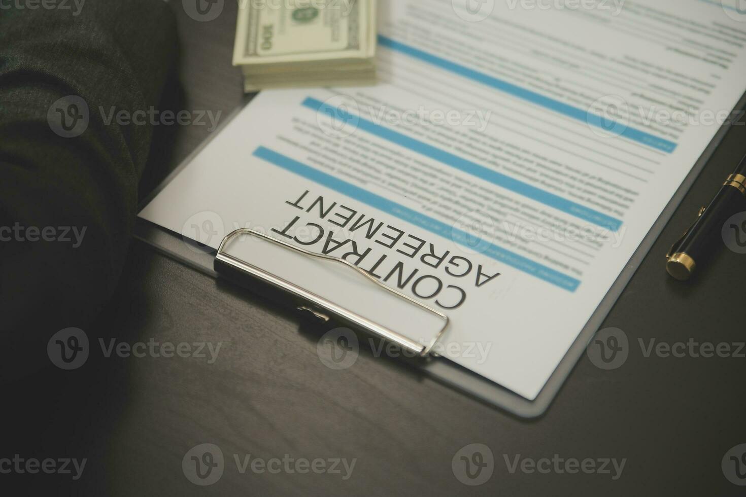 Business and lawyers discussing contract papers with brass scale on desk in office. Law, legal services, advice, justice and law concept picture with film grain effect photo