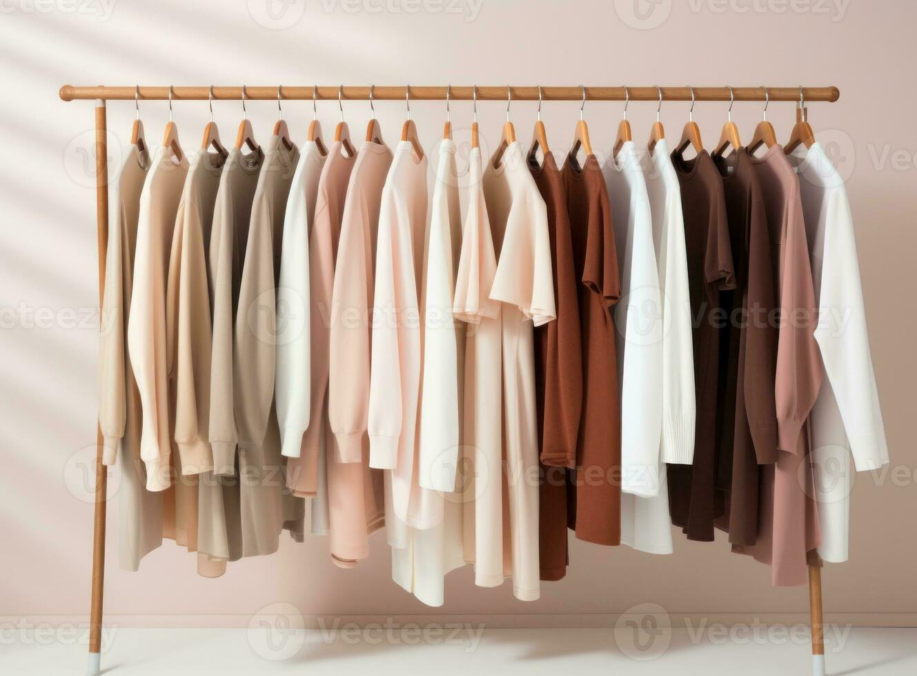 Clothes collection hanging on hangers photo
