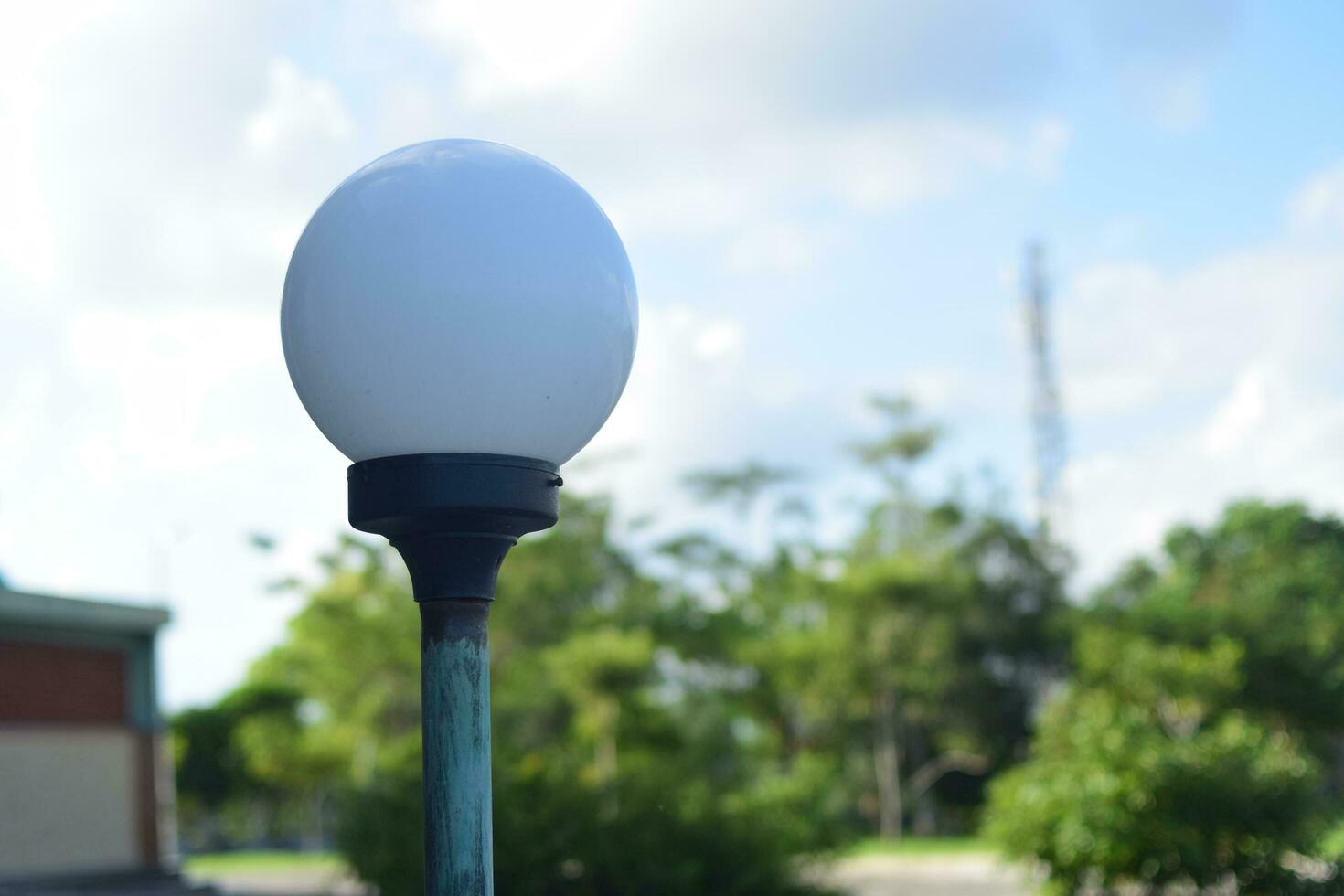 rural road lamp, White lamp on a steel pole, outdoor, selectable focus. photo