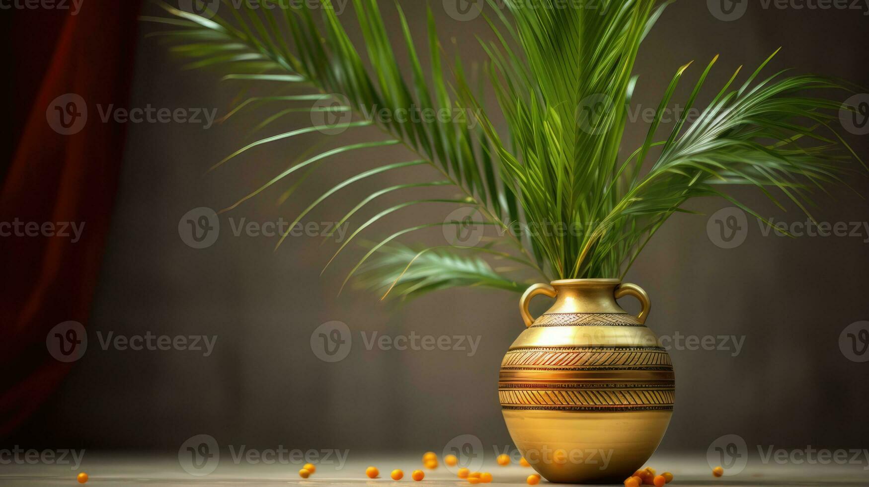 a large golden vase with palm fronds protruding from it. photo