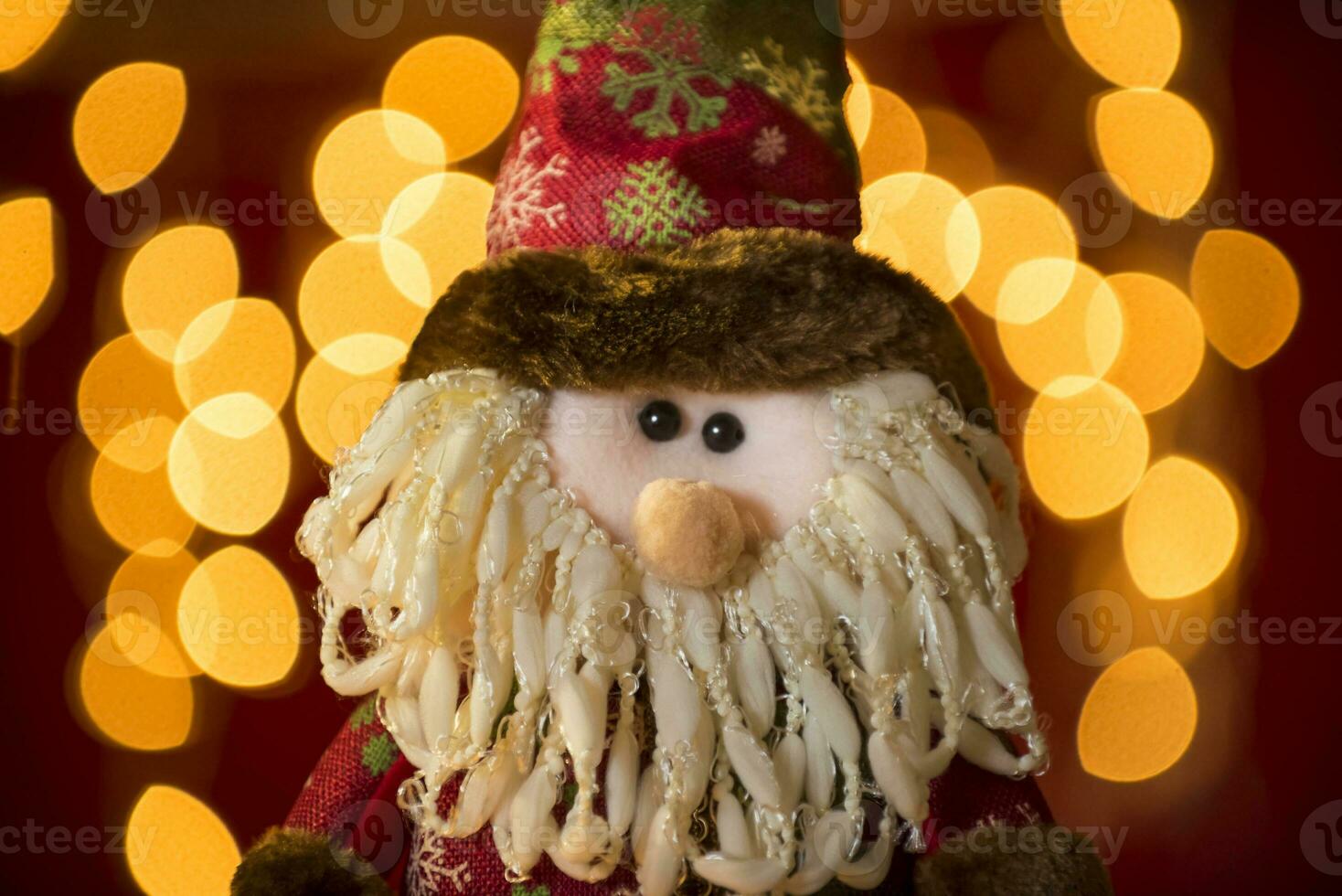 a stuffed gnome sitting on a chair photo