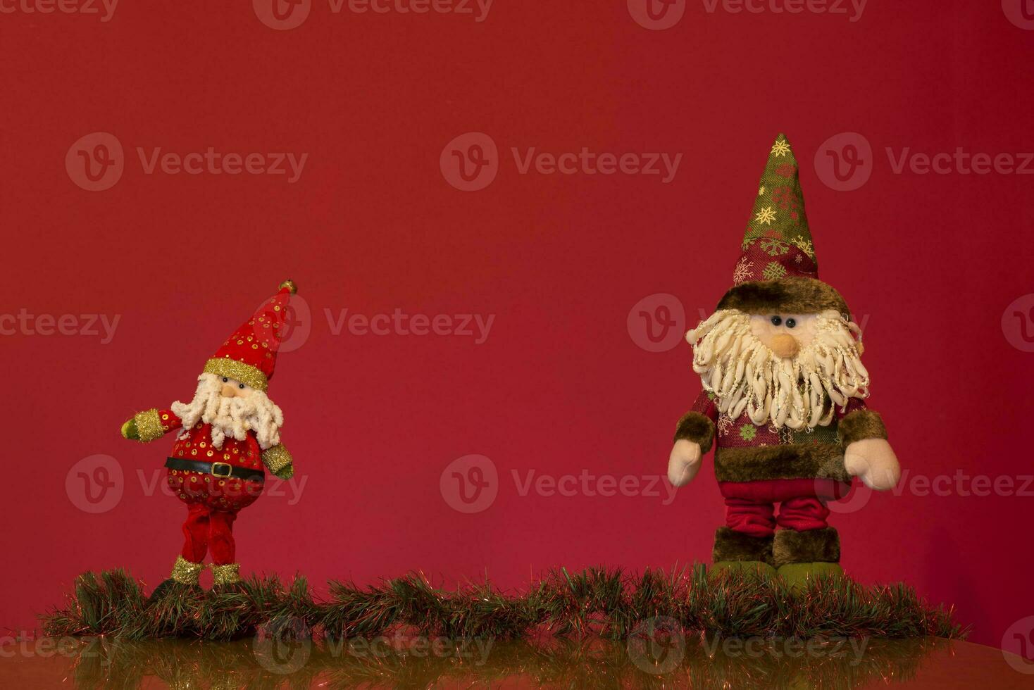 a santa claus doll with a beard and hat photo