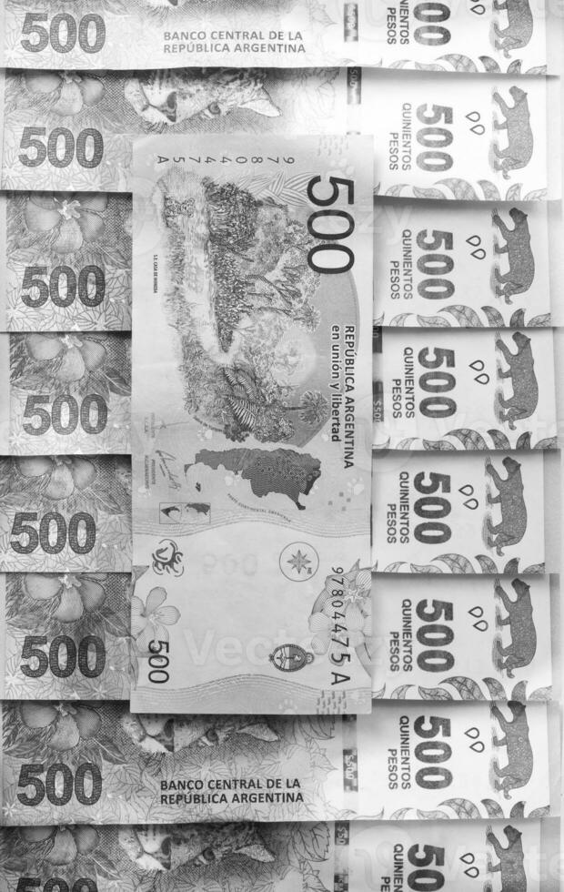 a pile of money is shown in black and white photo