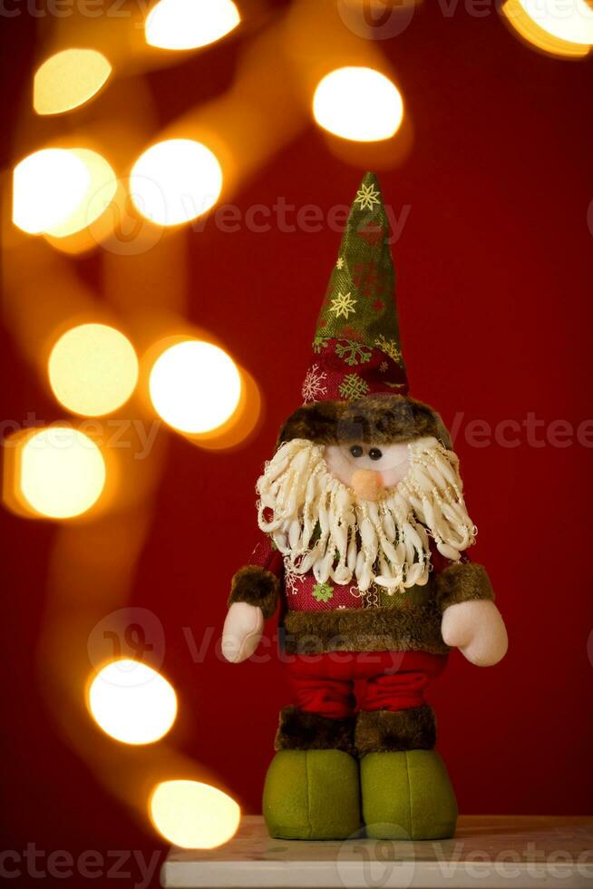 a santa claus claus with a beard and hat photo