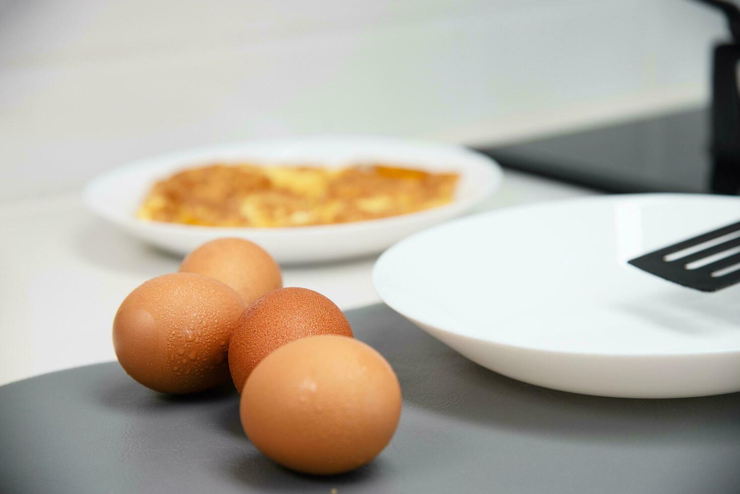 Chef is making fried egg in kitchen, famous everyday life food for Thai Asian people photo