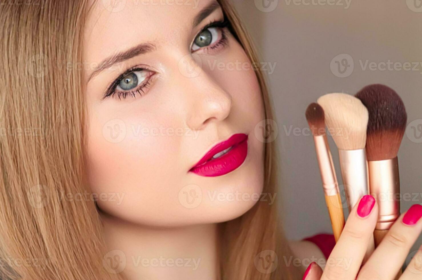 Beauty, makeup and cosmetics, face portrait of beautiful woman with make-up brushes, luxury cosmetic product, makeup artist or beauty blogger concept photo