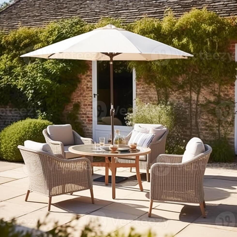 Modern garden lounge, outdoor furniture and countryside house patio decor with sofa, sun lounger, sunbed and umbrella, country cottage style, photo