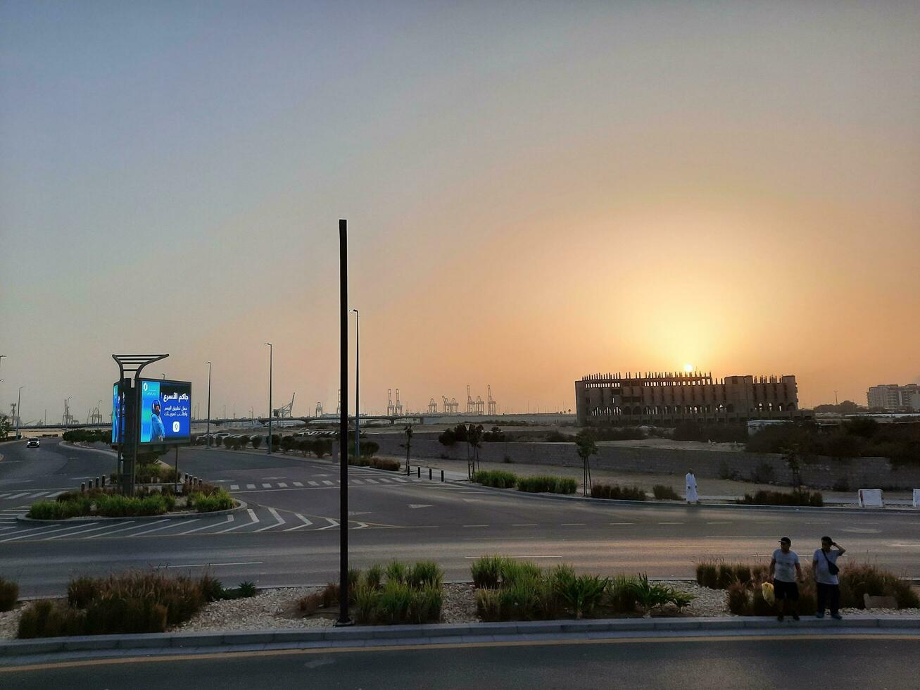 Jeddah, Saudi Arabia, June 2023 - A beautiful view of the port of Jeddah at sunset from the main road of Balad in the city of Jeddah, Saudi Arabia. photo