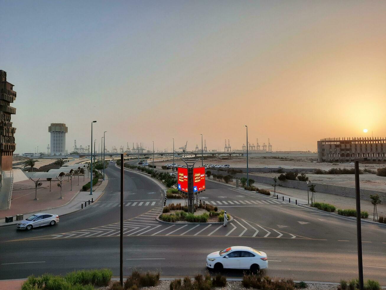 Jeddah, Saudi Arabia, June 2023 - A beautiful view of the port of Jeddah at sunset from the main road of Balad in the city of Jeddah, Saudi Arabia. photo
