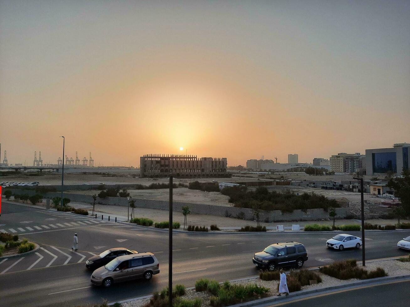 Jeddah, Saudi Arabia, June 2023 - A beautiful view of the port of Jeddah at sunset from the main road of Balad in the city of Jeddah, Saudi Arabia. photo