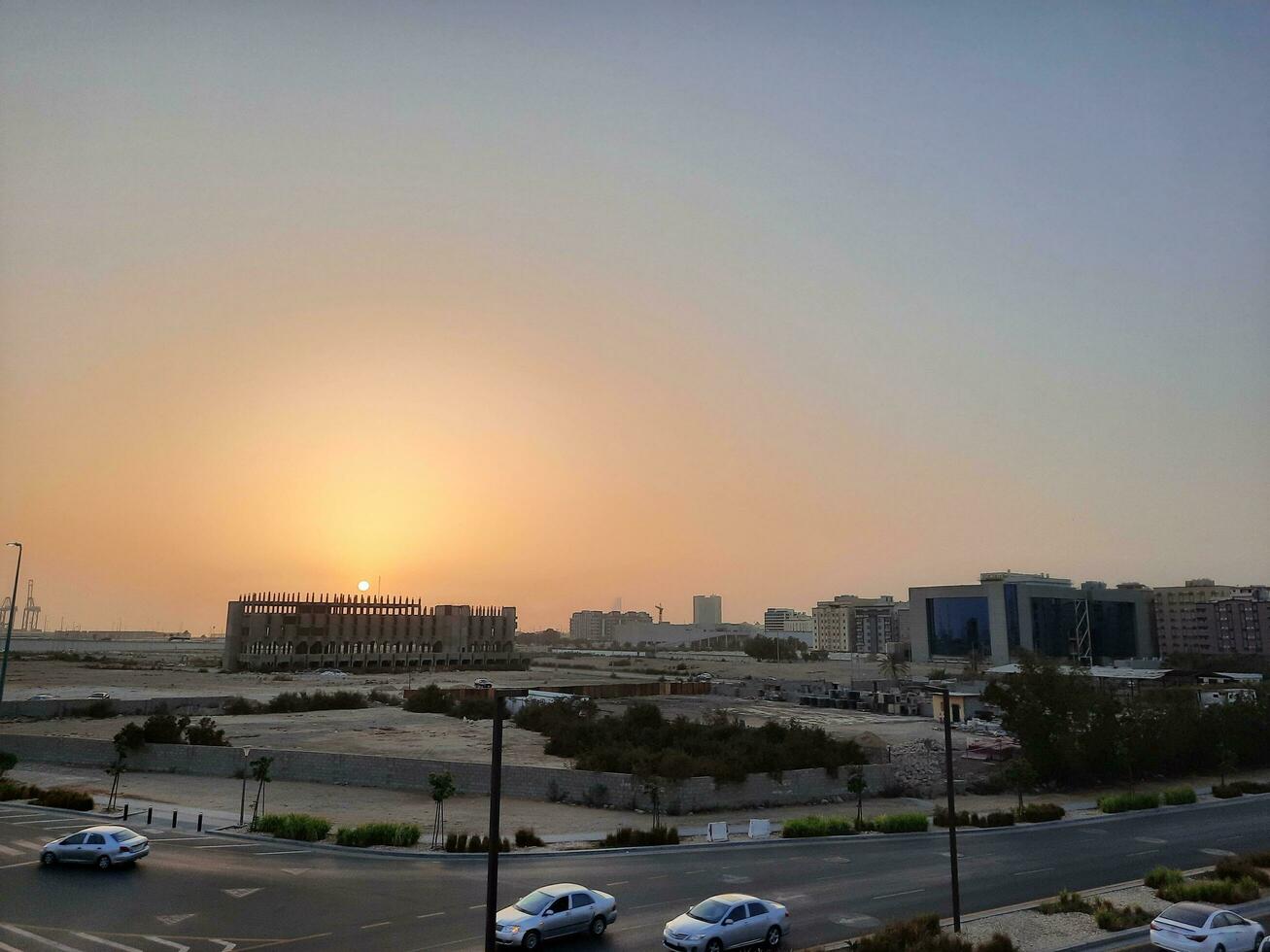 Jeddah, Saudi Arabia, June 2023 - A beautiful view of the port of Jeddah at sunset from the main road of Balad in the city of Jeddah, Saudi Arabia. photo