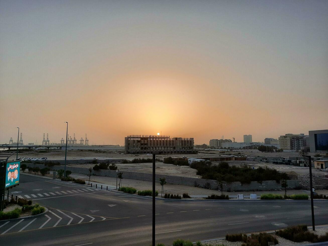 Jeddah, Saudi Arabia, June 2023 - A beautiful view of the port of Jeddah at sunset from the main road of Balad in the city of Jeddah, Saudi Arabia. photo