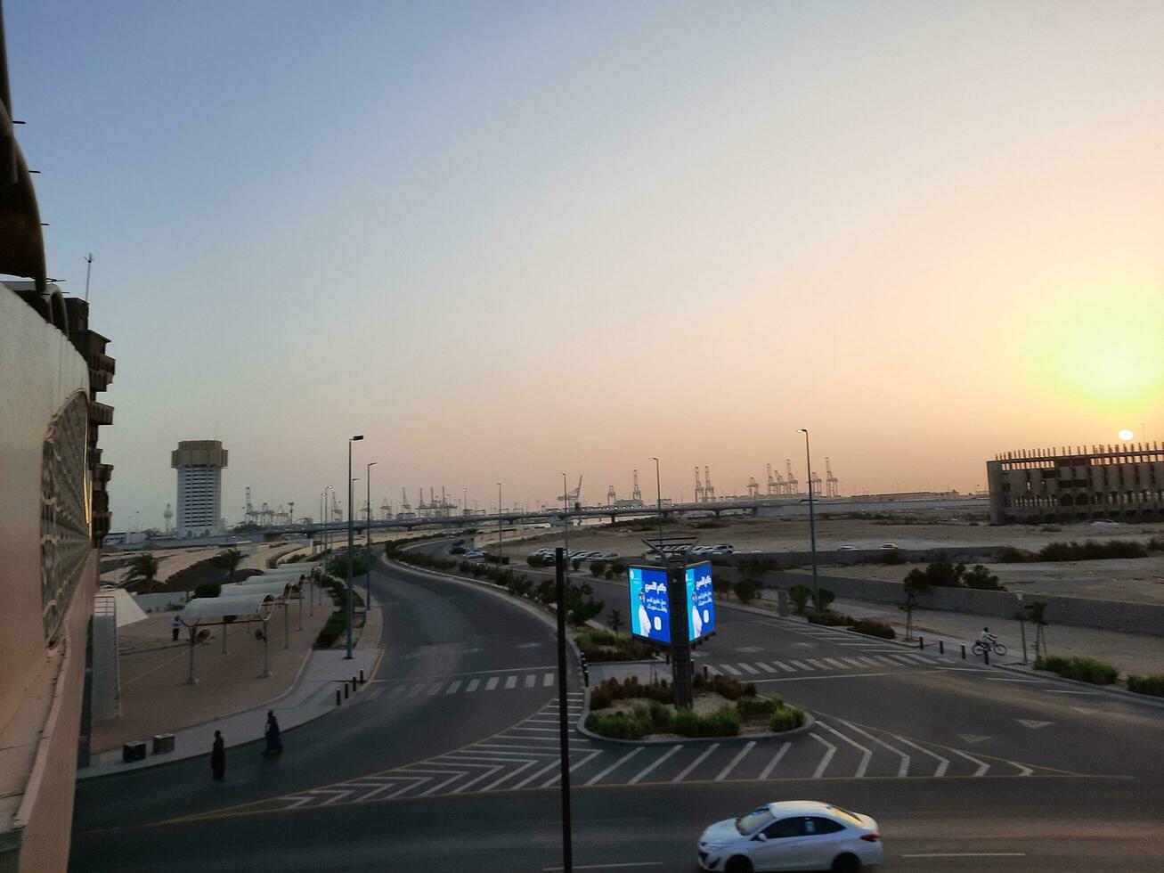 Jeddah, Saudi Arabia, June 2023 - A beautiful view of the port of Jeddah at sunset from the main road of Balad in the city of Jeddah, Saudi Arabia. photo