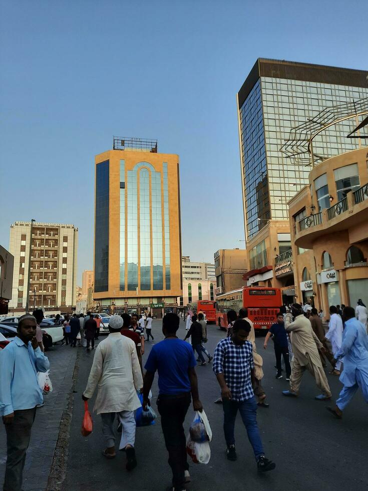 Jeddah, Saudi Arabia, June 2023 - There are vehicles and people on the main road of Balad, Jeddah, the main commercial center of Saudi Arabia. photo