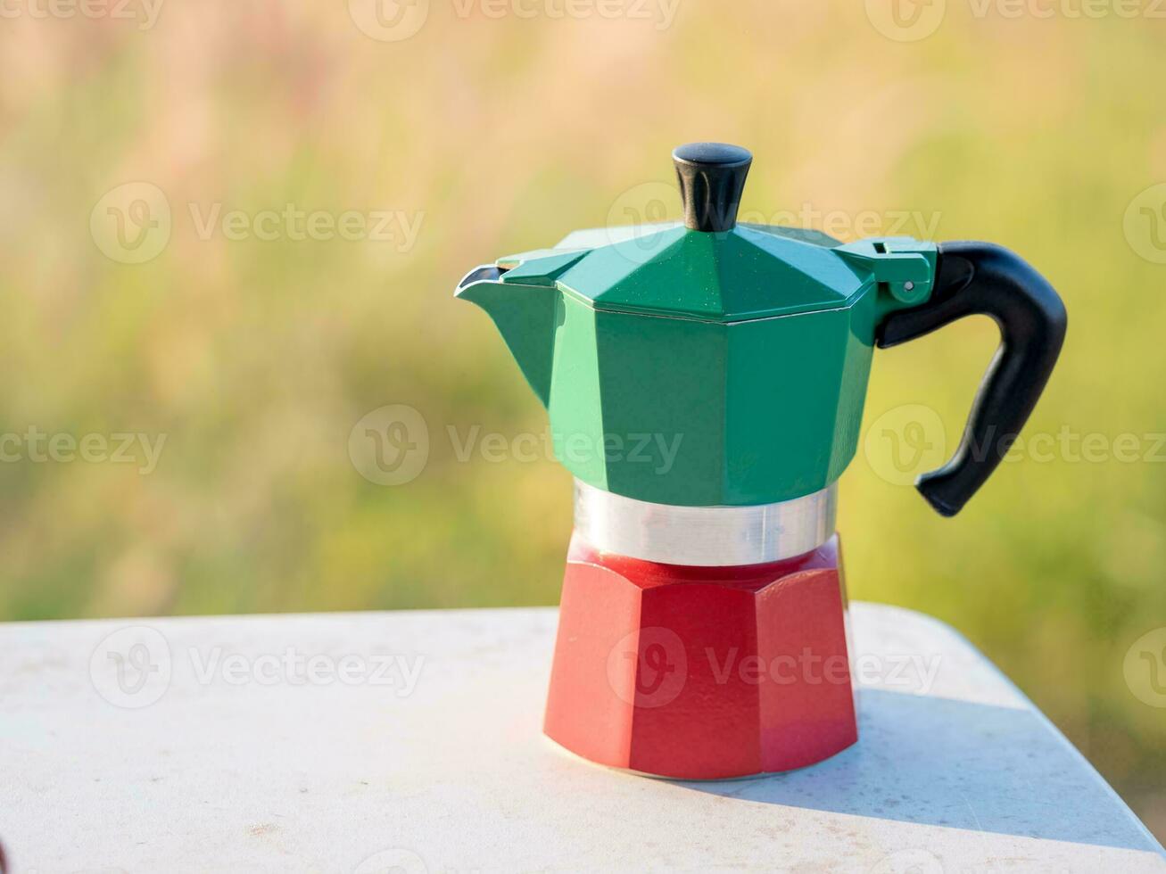 Moka Pot on the table in the morning photo