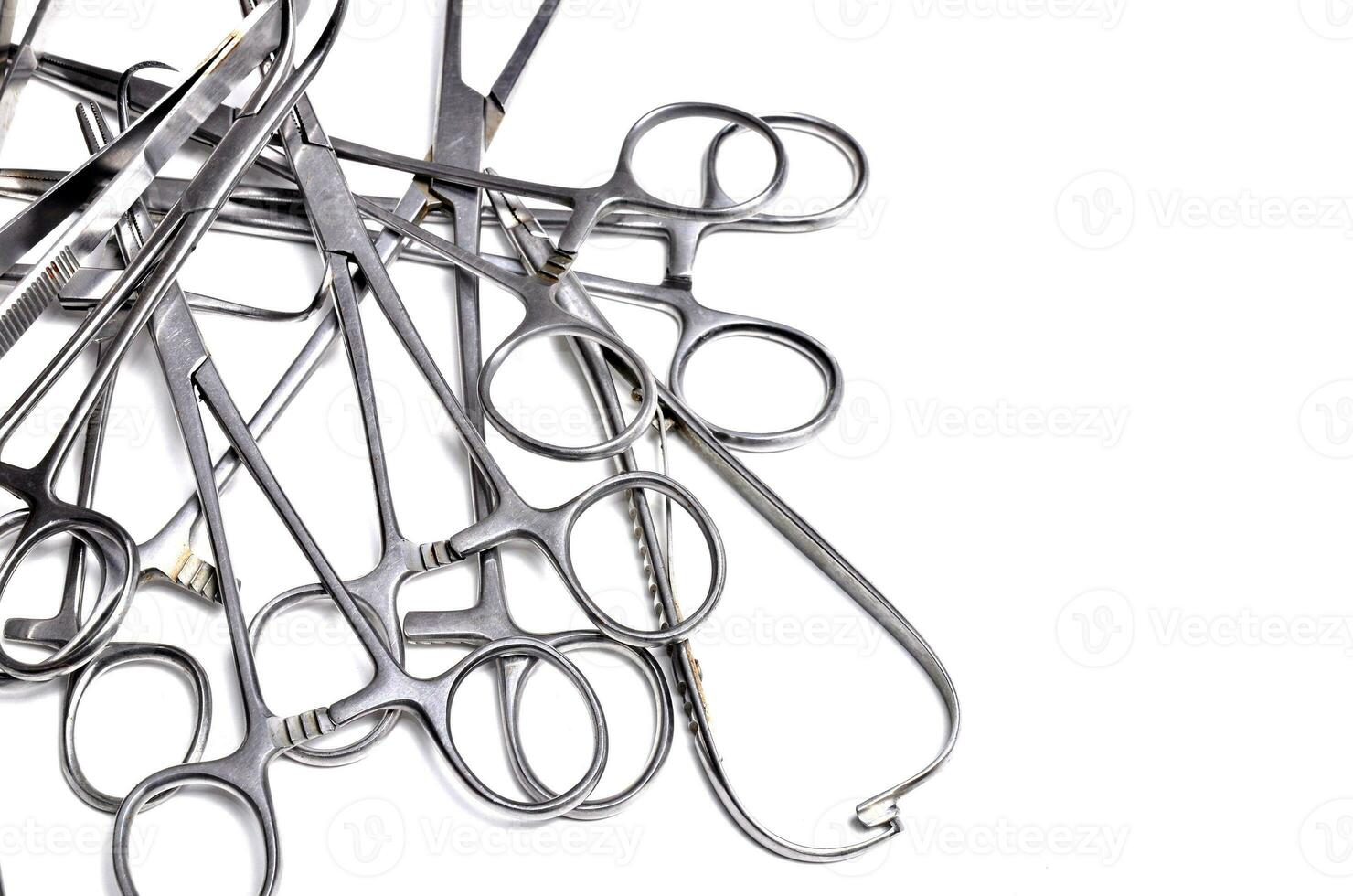 Surgical instruments on white background photo