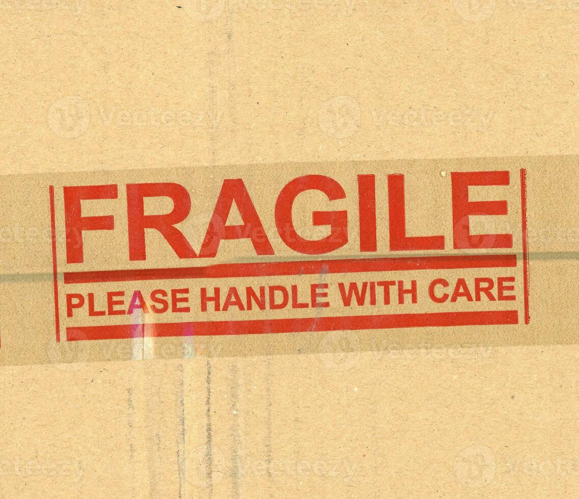 fragile handle with care brown corrugated cardboard box photo