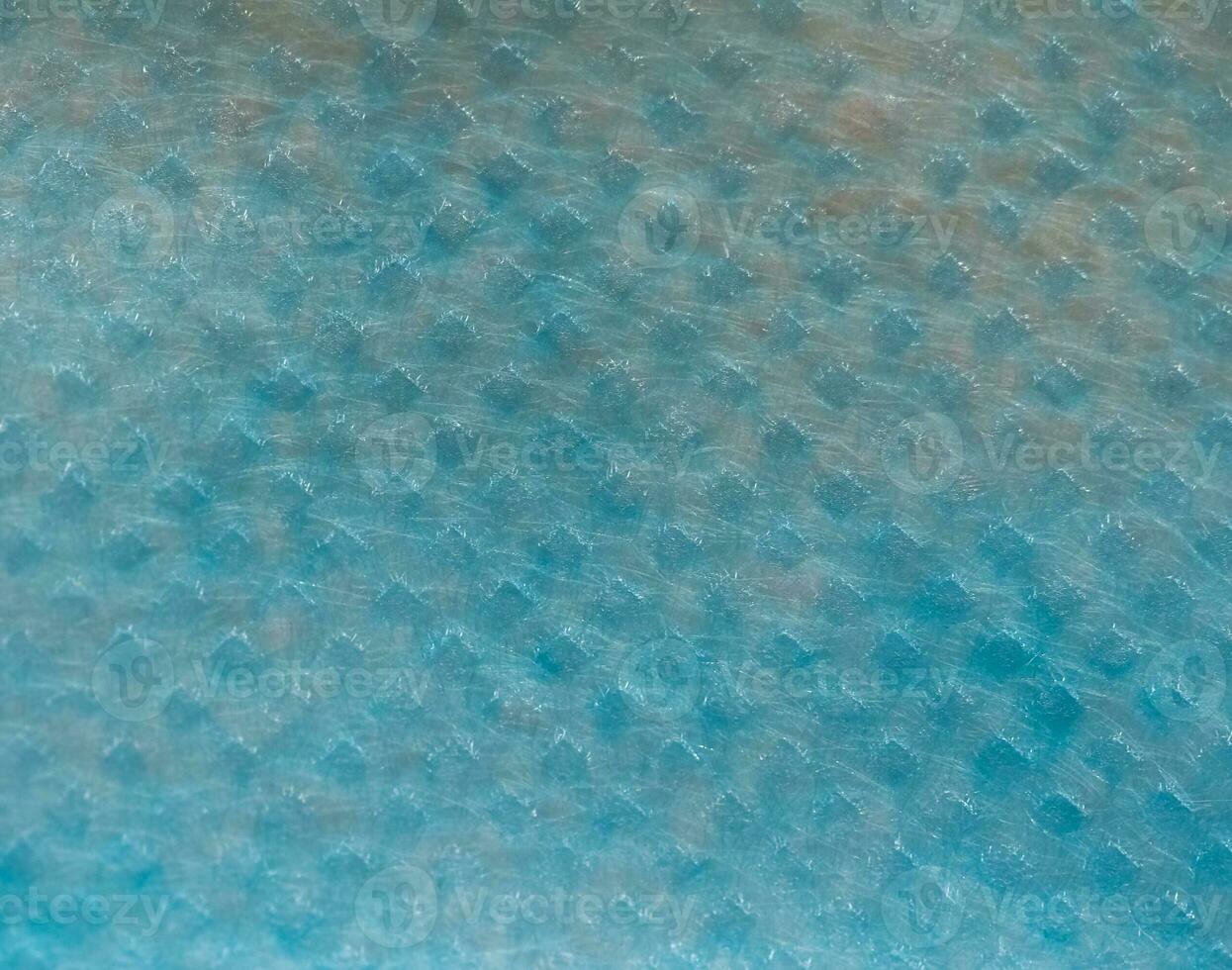 industrial style blue nonwoven polypropylene fabric texture back photo