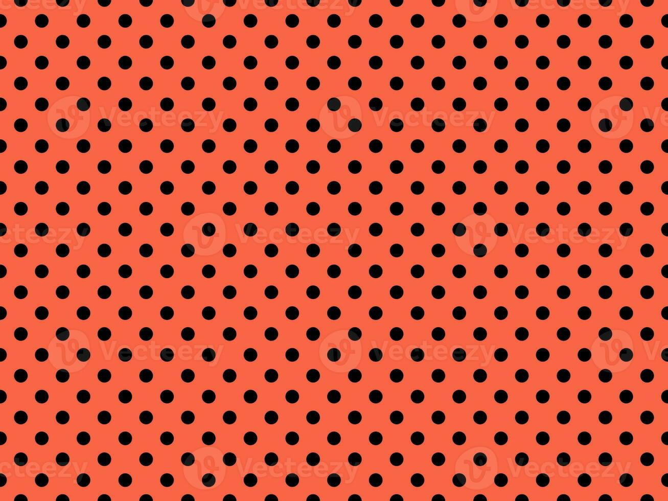 black polka dots over tomato background photo