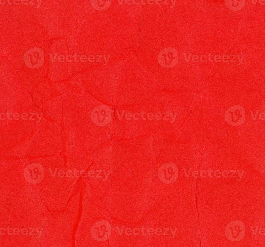 crumpled red paper texture background photo