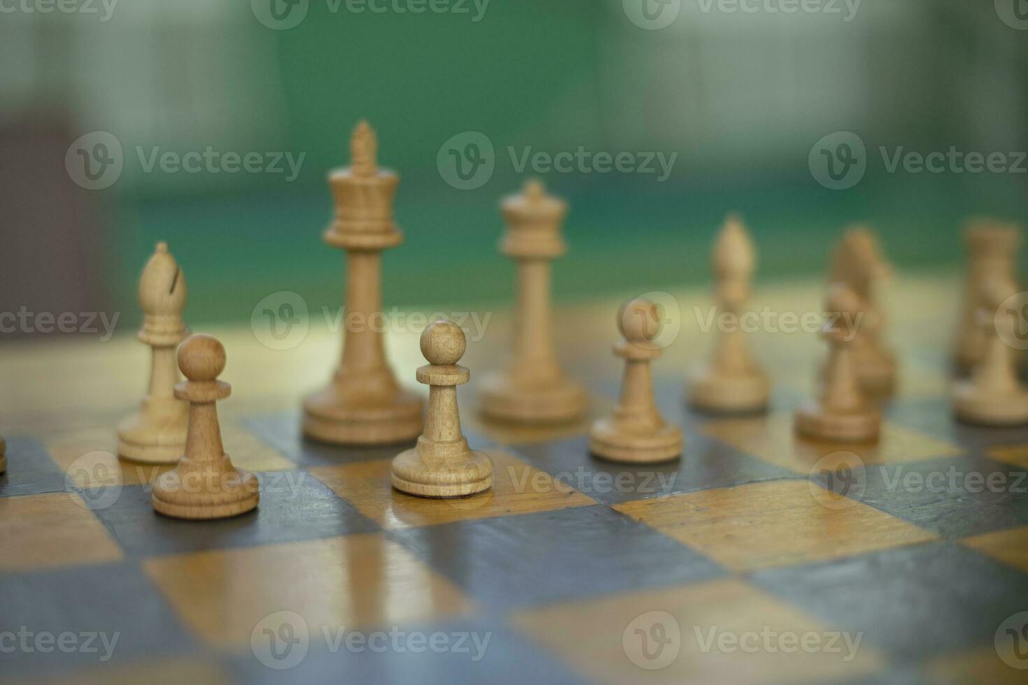 Chess pieces on table. Chess Tournament. Ancient Strategy. photo