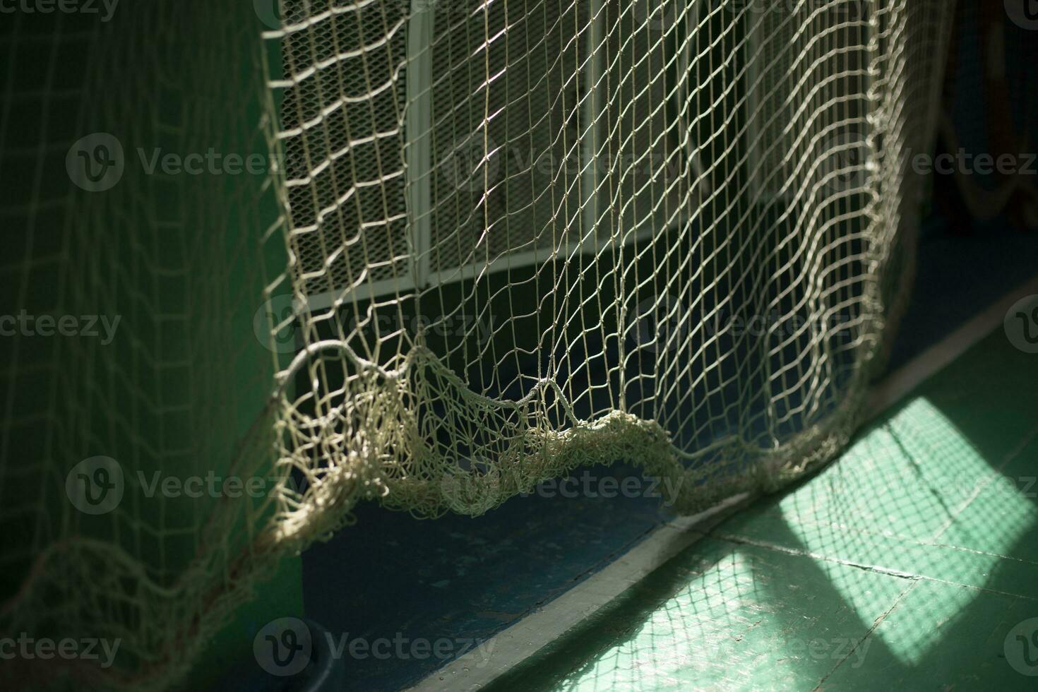 Net in gym. Mesh Details. Light in gym. photo