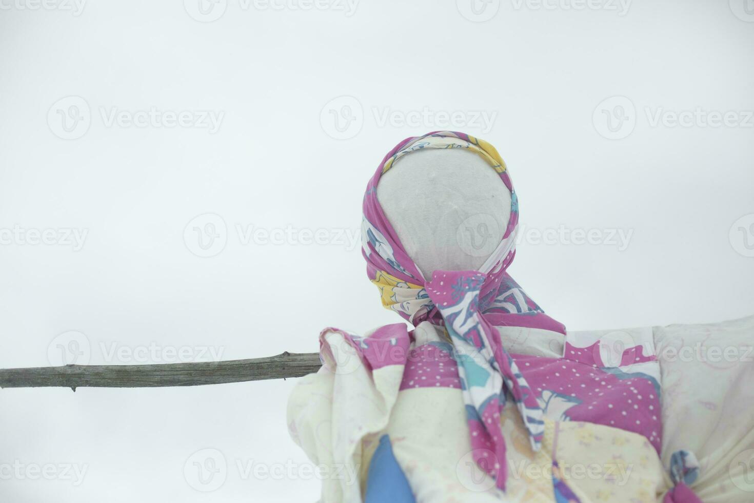 Symbol of spring in Russia. Pagan symbol of winter. Rag doll. Burning doll. photo