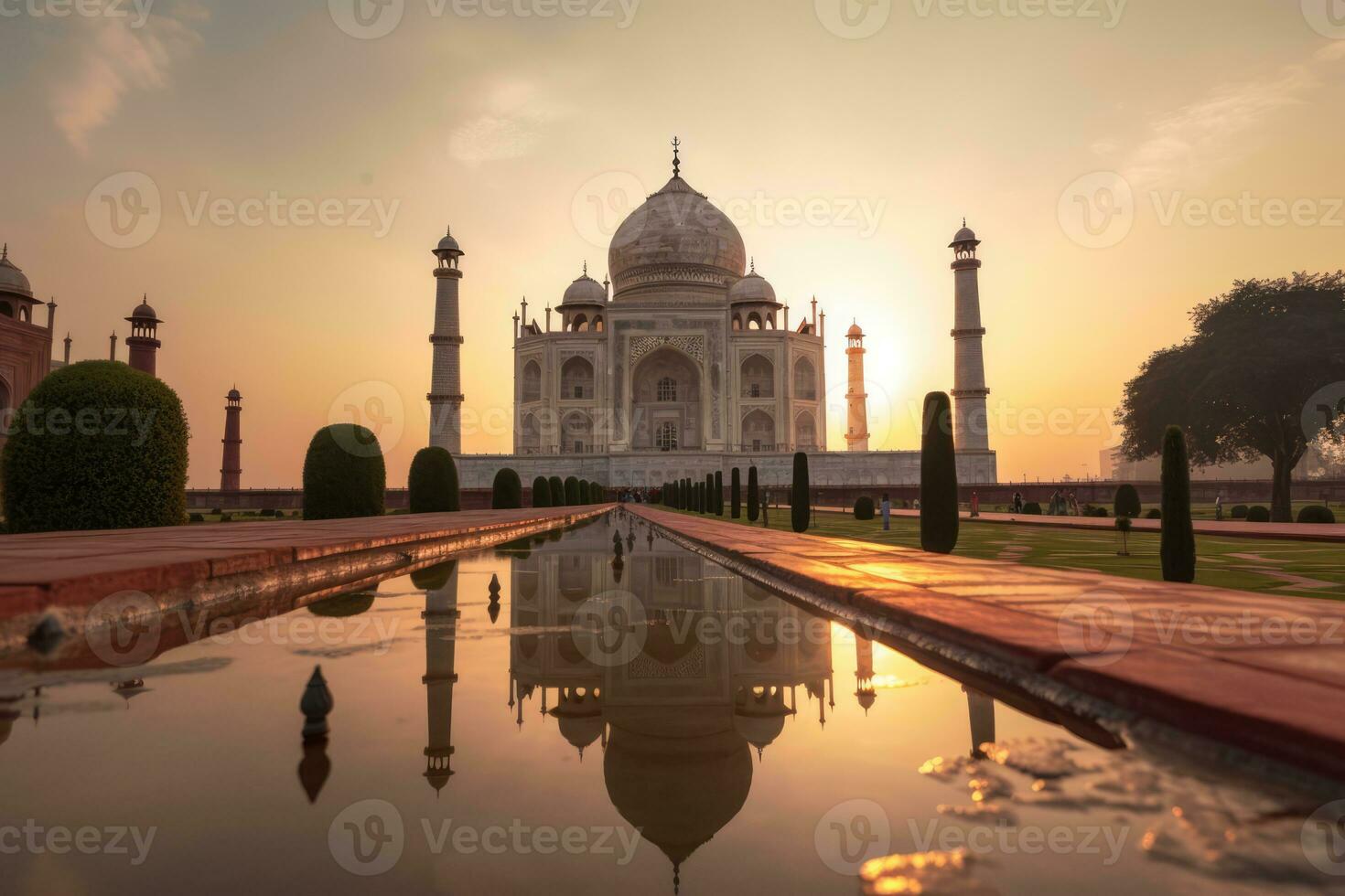 esta valores foto capturas el asombroso momento de un puesta de sol terminado el famoso taj mahal, un maravilloso blanco palacio en India. el del sol calentar resplandor yesos un encantador ligero en el Monumento, creando