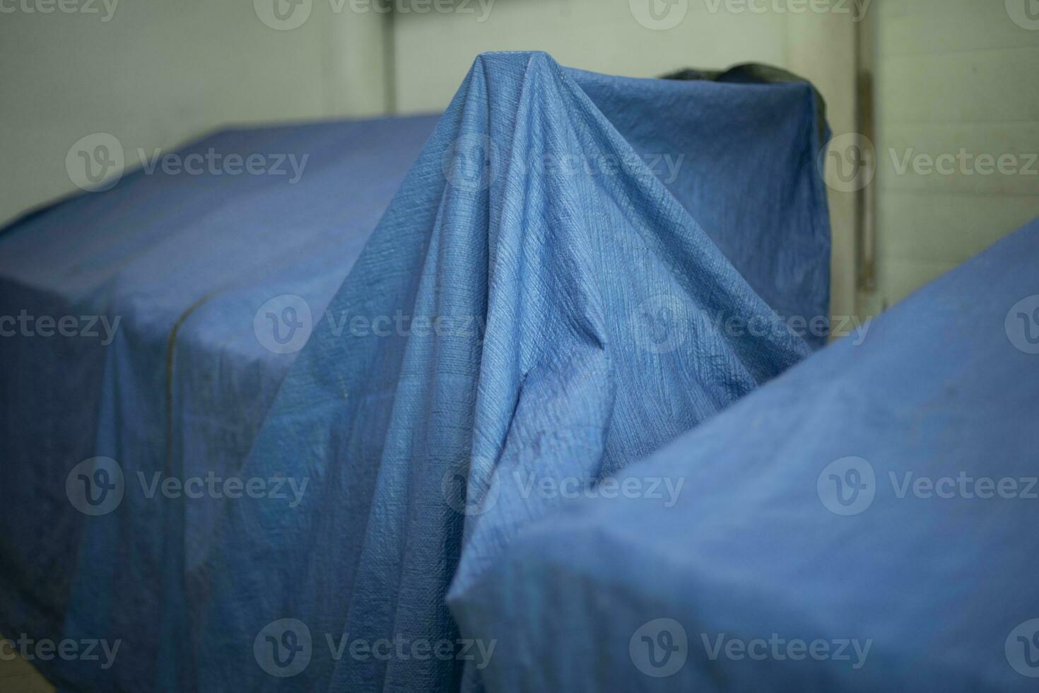 Closed market. Blue awning on market counter. Rain protection. photo