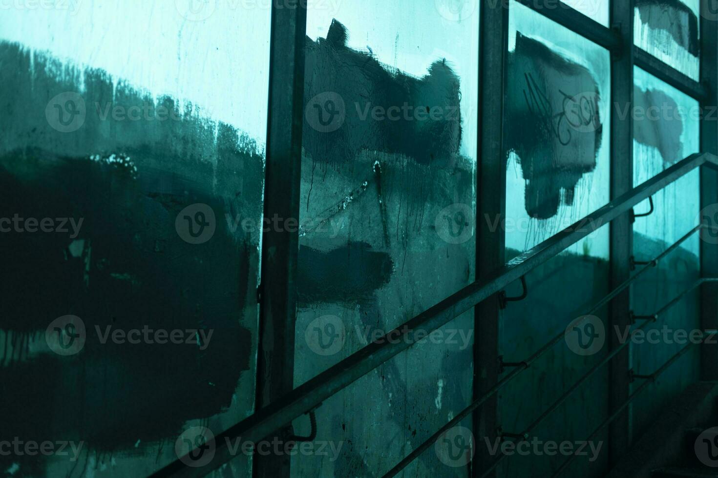 Blue tunnel. Blue color of glass in pedestrian crossing. Dark pedestrian crossing. photo