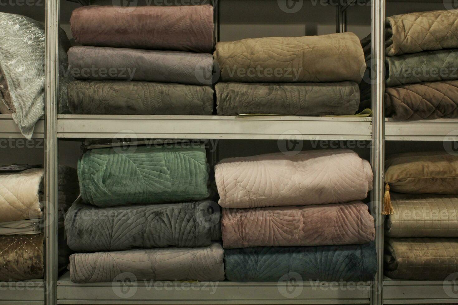 Stack of fresh towel on the shelf. Bath household organizer domestic spa textile equipment storage. Beauty body care hygiene procedure at bathroom. Shelving unit in home photo