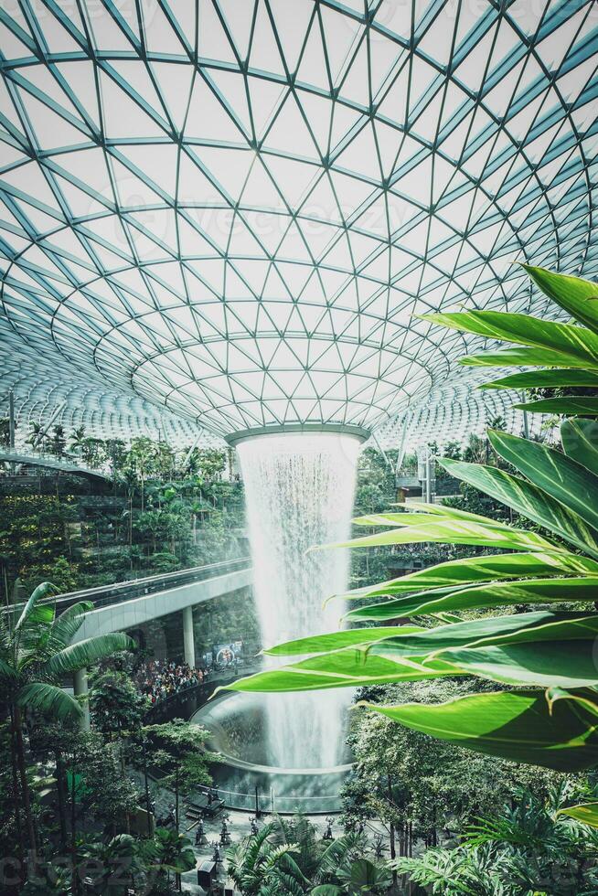 The Rain Vortex, which The Jewel calls another highlight of Singapore's Changi Airport, is the largest and tallest indoor waterfall in the world at 130 feet tall. photo