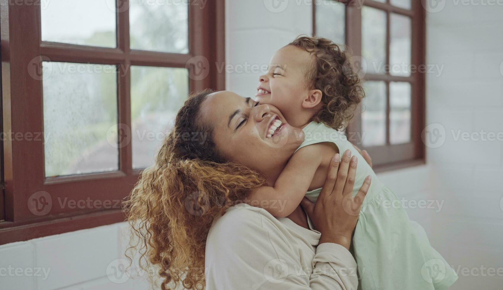 Happy family love, mother and her daughter, her daughter playing and hugging. photo