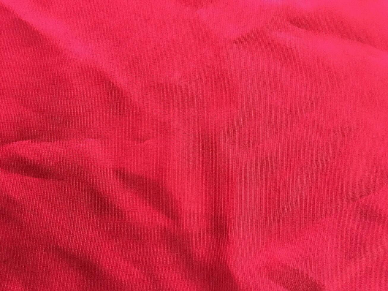 Close up of a red fabric textile texture photo